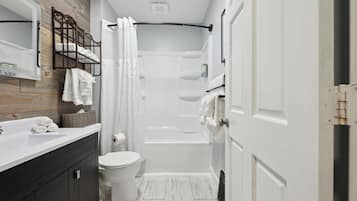 Hair dryer, towels, soap, shampoo