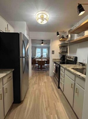 Fridge, oven, stovetop, coffee/tea maker