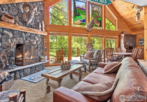 WATER FRONT Updated Cabin Close to Estes Park New Hot Tub 3 Private Acres