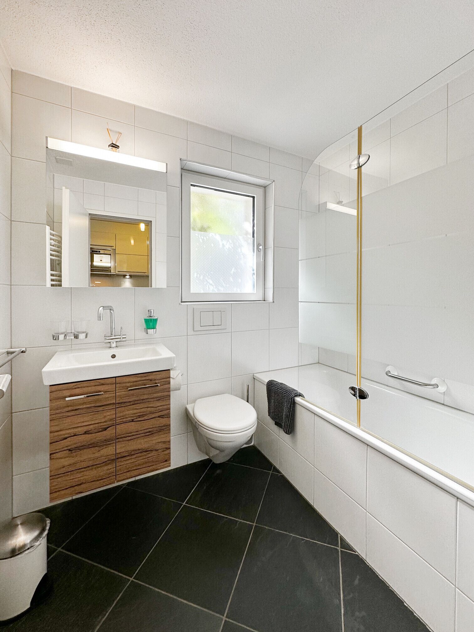 Bathtub, hair dryer, towels