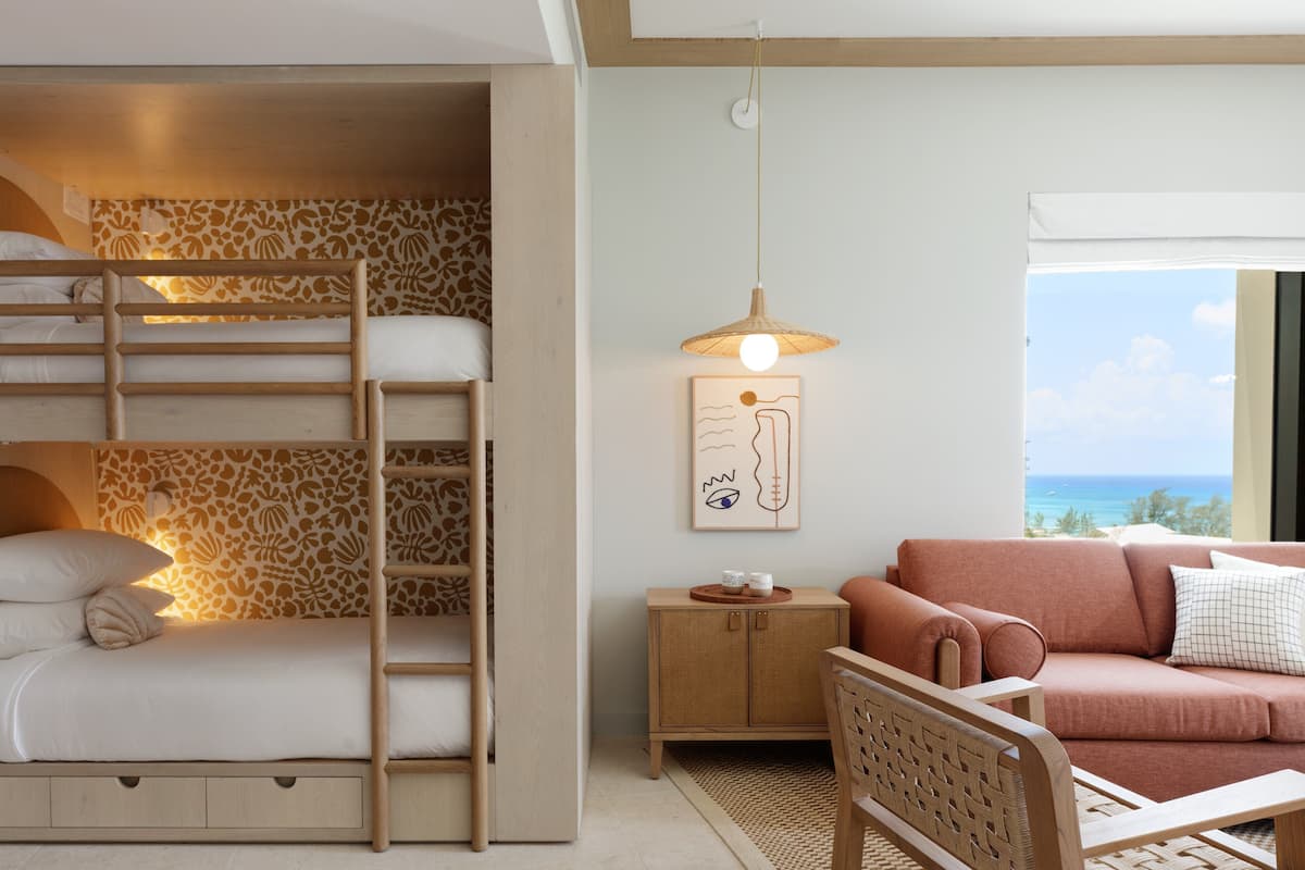 Family Suite, 1 Bedroom, Pool View (Family Room) | Blackout drapes, iron/ironing board, free WiFi, bed sheets