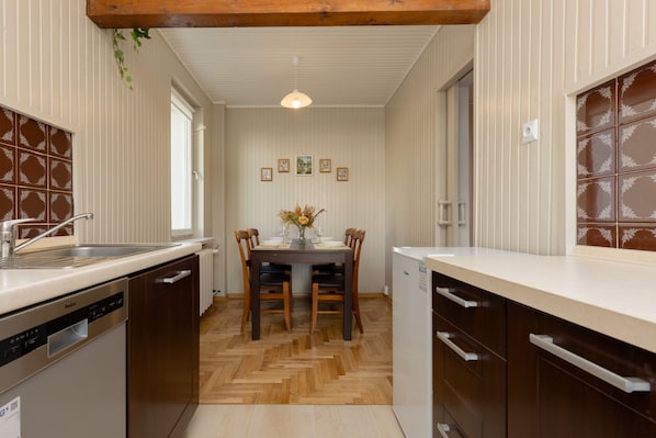 Apartment, 2 Bedrooms, 2 Bathrooms | Private kitchen | Microwave, dishwasher, cookware/dishes/utensils - 2-bedroom Franciszka Kawy 34 by Renters (Warsaw)