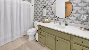 Hair dryer, towels, soap, shampoo