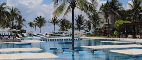 2 outdoor pools, open 7:00 AM to 9:00 PM, pool umbrellas, pool loungers