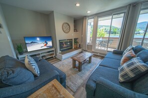 Premium Condo, 2 Bedrooms, Patio, Lake View (Argentine 1511) | Living area | Smart TV, fireplace - Argentine 1511 (Keystone)