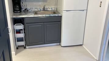 Fridge, microwave, coffee/tea maker, toaster