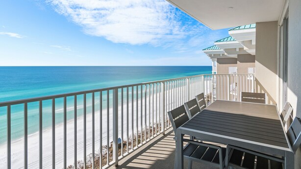 A balcony with a view of the beach and ocean. - Majestic Sun A1206*12th-Top Floor*Gulf View*6 Beds*Heated Pool/Hot Tubs*Gym (Miramar Beach)