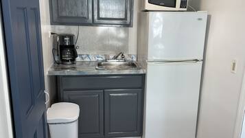 Fridge, microwave, coffee/tea maker, toaster