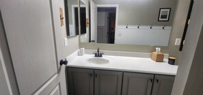 Hair dryer, towels, soap, toilet paper
