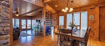 Charming Cottage on the Bay and Golf Course with private patio and boat dock.