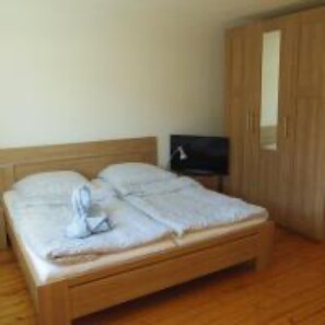 3 dormitorios, tabla de planchar con plancha, wifi gratis y ropa de cama