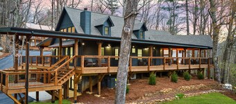 The Coop | Woodland cabin in Blairsville with wraparound porch & fireplace