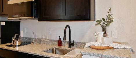 Fridge, microwave, coffee/tea maker, toaster