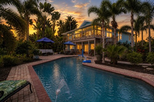 Your Hidden Florida Retreat | 4 King Suites, Luxury Kitchen, Heated Pool & Beach Adventures