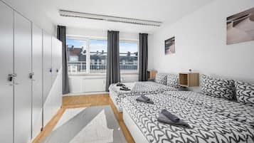 3 habitaciones, tabla de planchar con plancha, wifi y ropa de cama