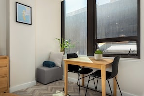 Apartamento urbano | Opções para refeição no quarto