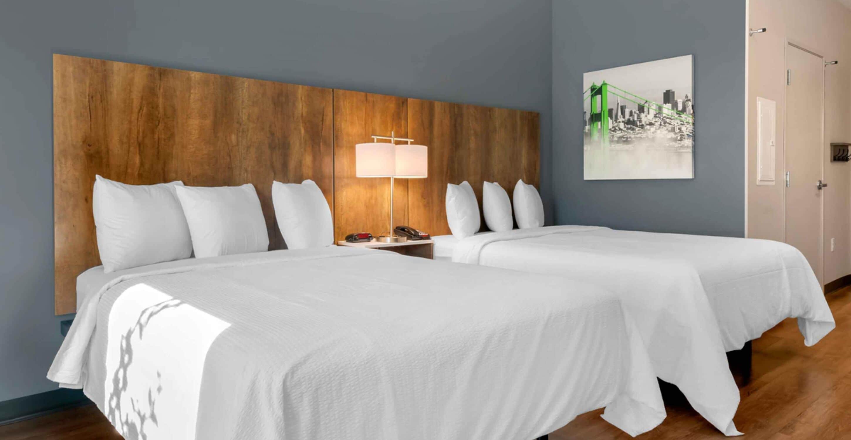 studio, 2 queen beds, non smoking | premium bedding, desk, iron/ironing board, free wifi