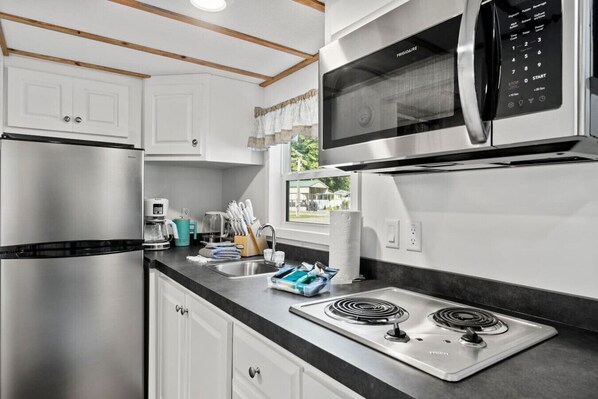 Fridge, microwave, stovetop, coffee/tea maker - Breezy, Riverfront Tiny Home, King Bed, and Deck (Sylva)