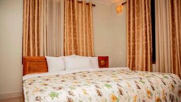 Deluxe Double Room Single Use | Premium bedding, pillowtop beds, desk, laptop workspace