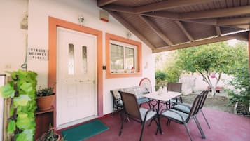 Family House, Multiple Bedrooms, 2 Bathrooms, Mountainside (Yiannis' Maizonette Ancient Olympia) | Outdoor dining