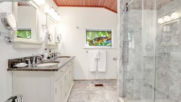 Shower, hair dryer, towels, soap