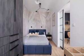 1 dormitorio, tabla de planchar con plancha, wifi y ropa de cama