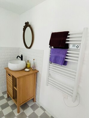 Shower, hair dryer, towels, toilet paper