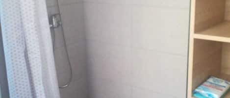 Shower, free toiletries, hair dryer, towels