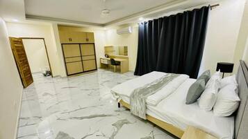 Luxury Apartment, 1 Bedroom, Kitchenette, City View | Premium bedding, down duvets, desk, laptop workspace