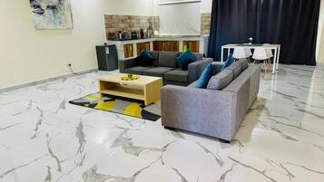 Luxury Apartment, 1 Bedroom, Kitchenette, City View | Bathroom | Shower, free toiletries, hair dryer, towels