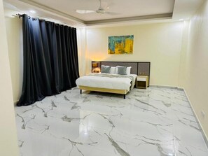 Luxury Apartment, 1 Bedroom, Kitchenette, City View | Premium bedding, down duvets, desk, laptop workspace - Cterra Dodoma Luxury Suites (Dodoma)