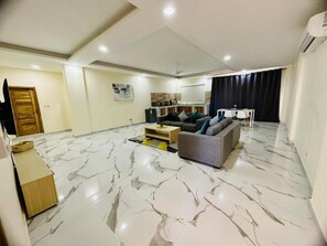 Luxury Apartment, 1 Bedroom, Kitchenette, City View | Premium bedding, down comforters, desk, laptop workspace - Cterra Dodoma Luxury Suites (Dodoma)