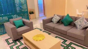 Luxury Studio, 1 Bedroom, Kitchenette, City View | Living area | Smart TV