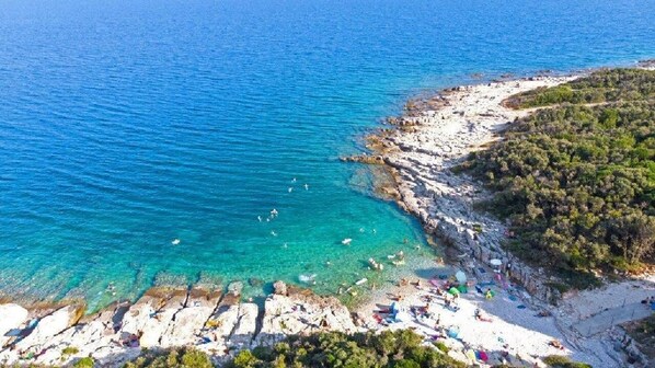 Beach nearby, sun loungers