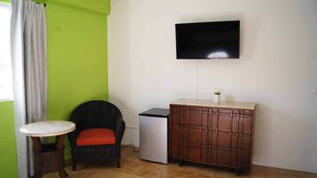 Habitación Premier | Cortinas blackout, tabla de planchar con plancha y wifi gratis