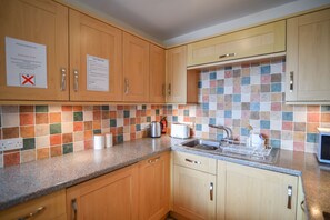 Fridge, dishwasher, electric kettle, toaster