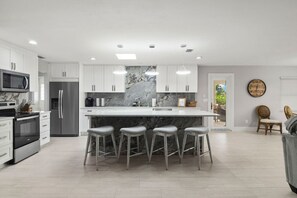 Fridge, microwave, oven, stovetop - Serene Bayfront Stay • Dock • Hot Tub • Near Beach (Bonita Springs)