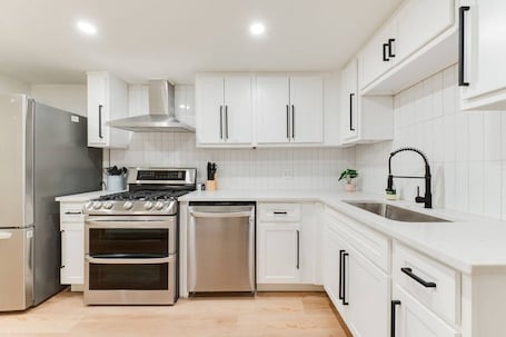 Fridge, microwave, oven, stovetop. Chateau Urbane- a luxe escape