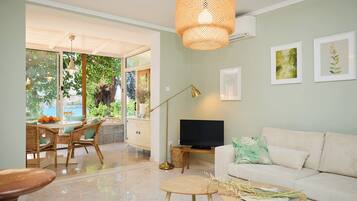 Apartment (2 Bedrooms) | Living room | 102-cm flat-screen TV with digital channels