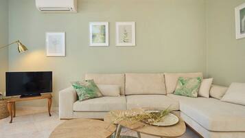 Apartment (2 Bedrooms) | Living room | 102-cm flat-screen TV with digital channels