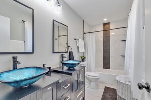 Hair dryer, towels, soap, shampoo