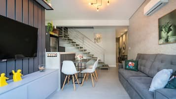 Apartamento | Área de estar | TV