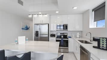Microwave, coffee/tea maker, toaster, paper towels