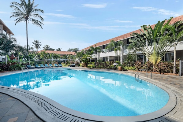 Outdoor pool, open 8:00 AM to 8:00 PM, pool umbrellas, pool loungers