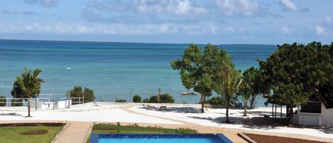 Outdoor pool, pool umbrellas, sun loungers