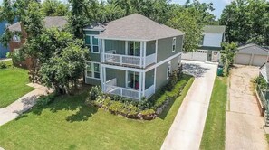 Relax on the upper-floor balcony or dine al fresco in this residence.
