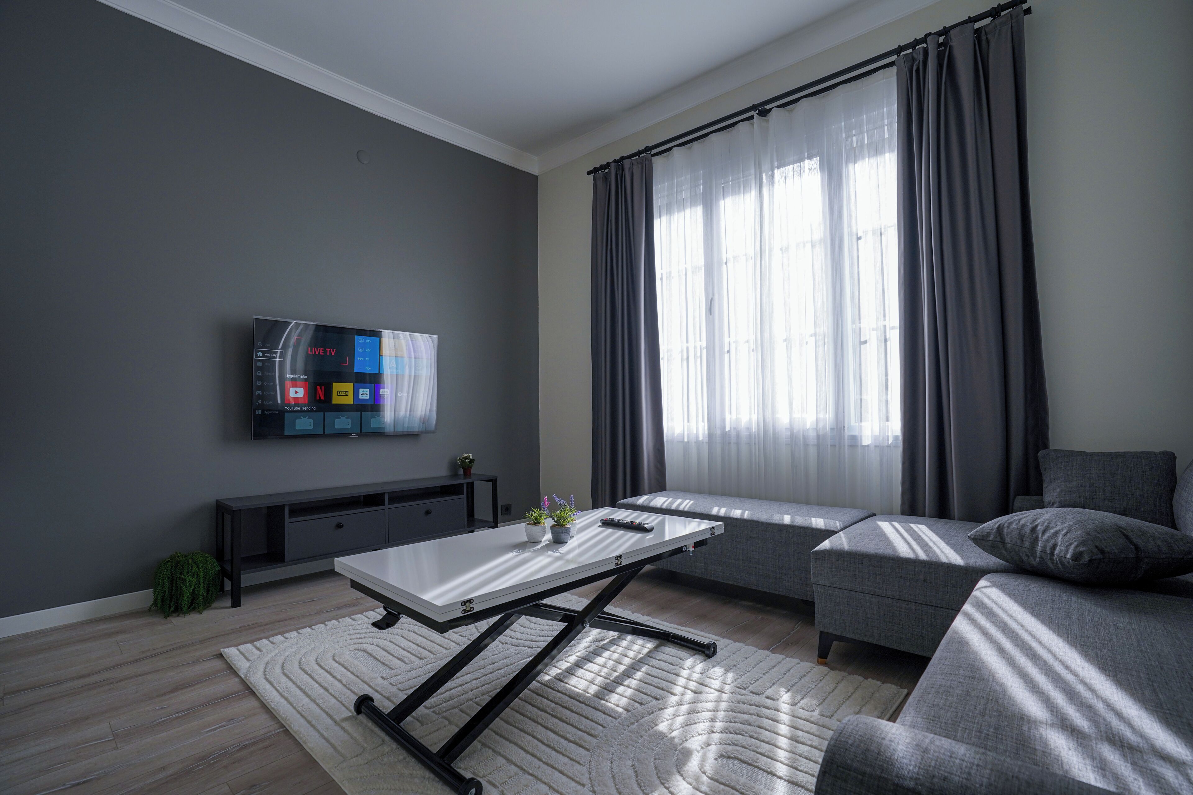 Basic Apartment | Living area | 100-inch Smart TV with cable channels, heated floors