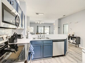 Fridge, microwave, oven, stovetop - Terra Verde Resort Stay: Themed Townhome w/ Jacuzzi, Near Disney (Kissimmee)