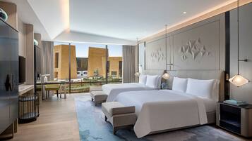 Premium bedding, memory foam beds, minibar, in-room safe