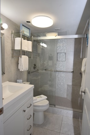 Shower, towels, soap, shampoo